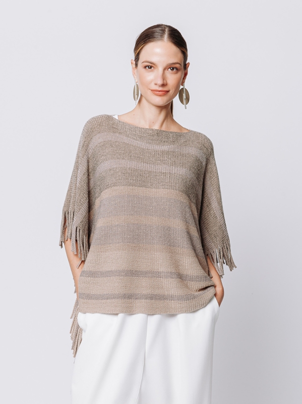 Knitted poncho with fringes