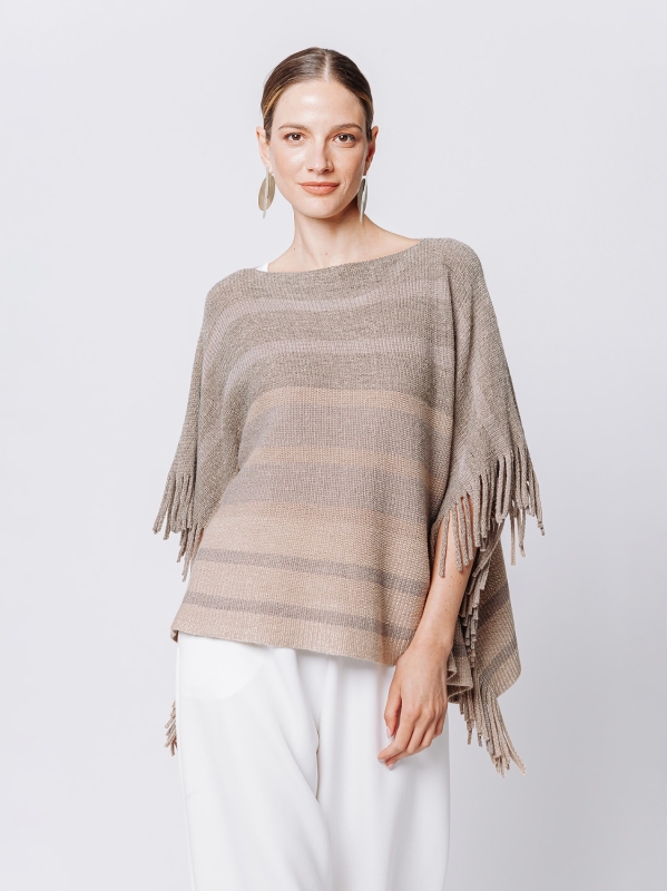 Knitted poncho with fringes